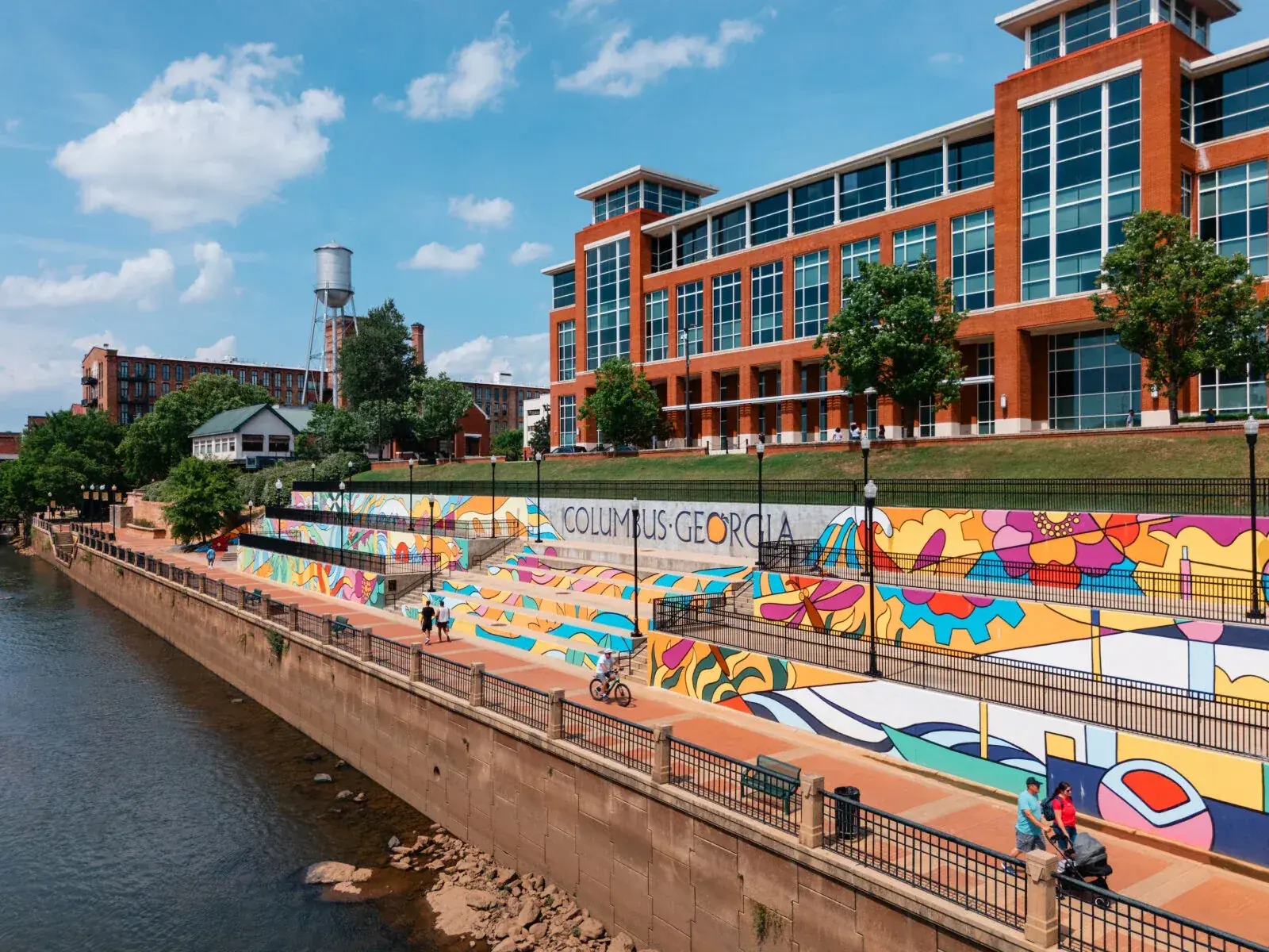 Columbus, Georgia riverwalk with colorful murals along the Chattahoochee River